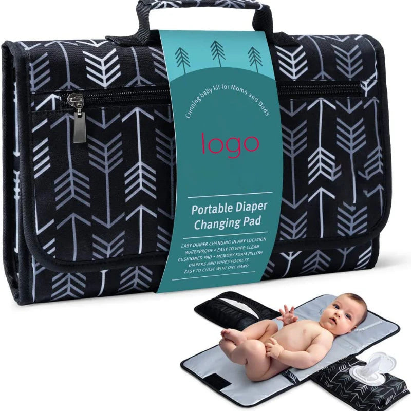 Portable waterproof baby changing pad with built-in diaper and wipes pockets